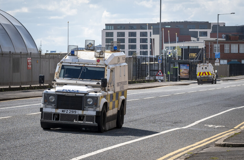 Two PSNI Pangolin armoured Land Rovers on Queen's Road, Belfast, April 2023 — OVIK's Defender 110-based public-order vehicle, still in service three years after the company's liquidation.