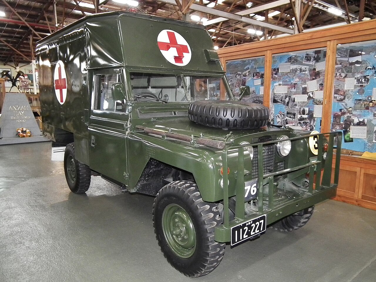 Preserved 109-inch "Bloodbox" ambulance ARN 112-227, a 1963 Series 2A, in bronze green with red crosses on white discs at the Army Museum Bandiana, Victoria