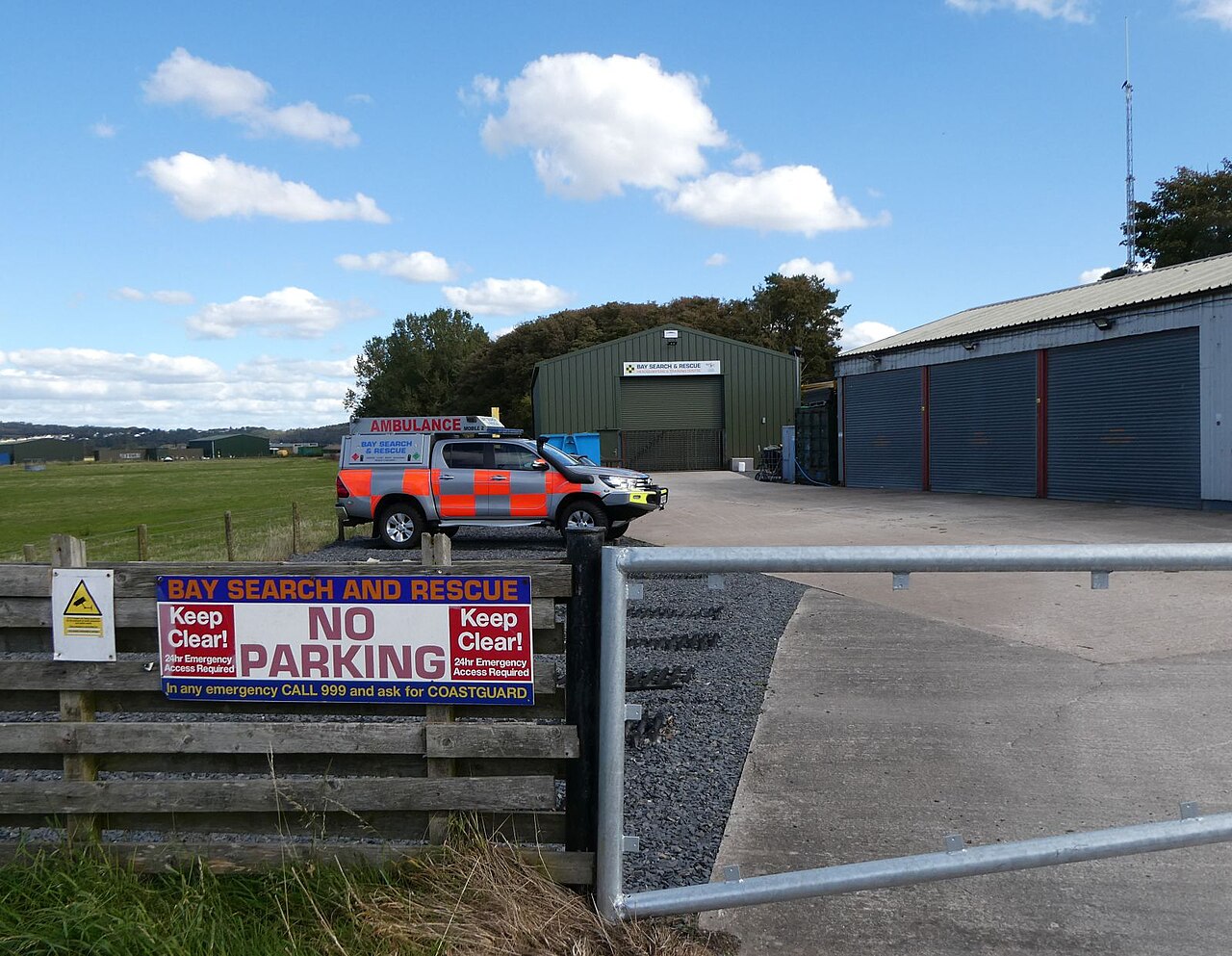 Bay Search & Rescue's Flookburgh base in 2025, with the team's later Toyota Hilux ambulance outside the Hägglund sheds