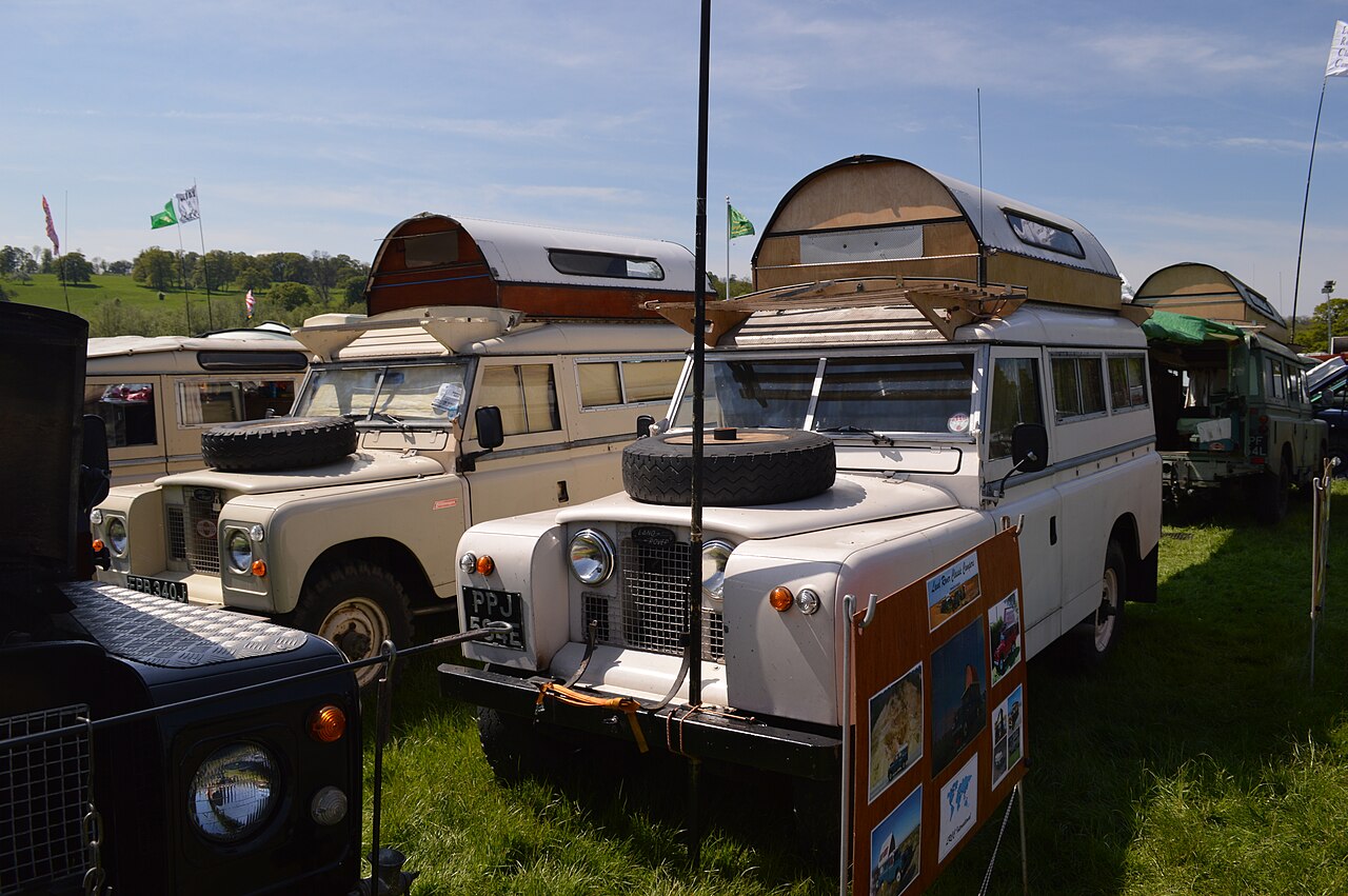 Civilian Carawagon conversions with the Searle elevating roof raised, at a Land Rover gathering in North Yorkshire