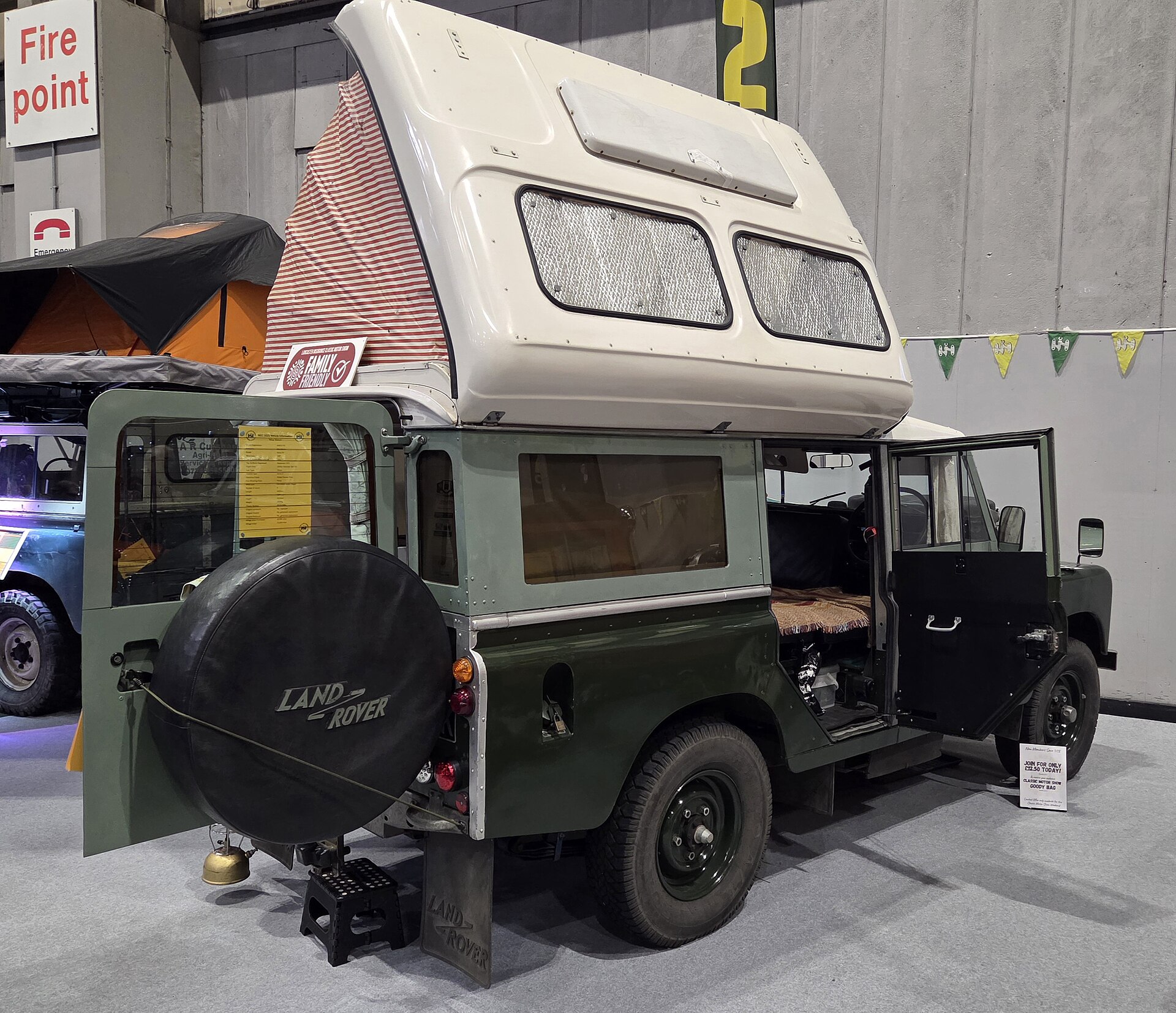 Series Land Rover 109 Dormobile camper with the elevating roof raised, Classic Motor Show, NEC Birmingham, 2025