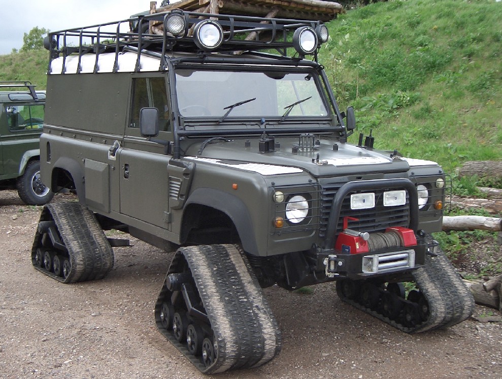 Global Expedition Wolf Defender 110 on its Mattracks track units at a Gaydon museum event
