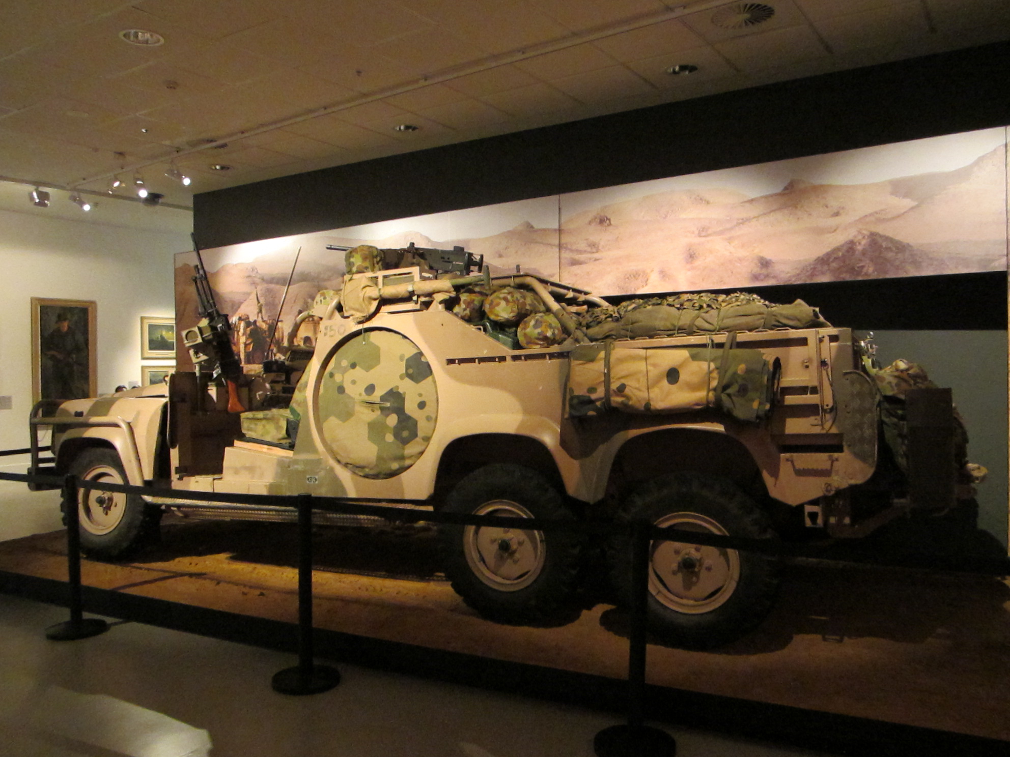 SASR Long Range Patrol Vehicle, damaged on operations in Afghanistan, on display at the Australian War Memorial in 2012
