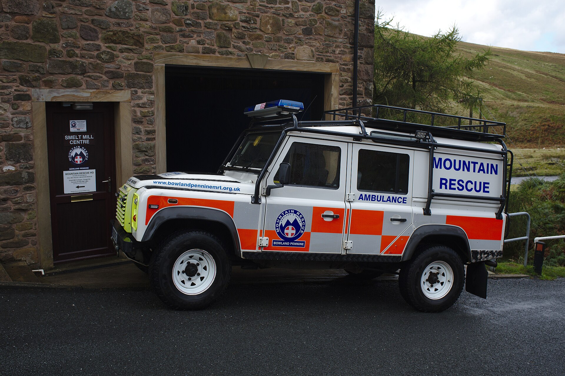 Bowland Pennine MRT Defender 110 mountain rescue ambulance with roof rack and stretcher stowage at the team's Smelt Mill base