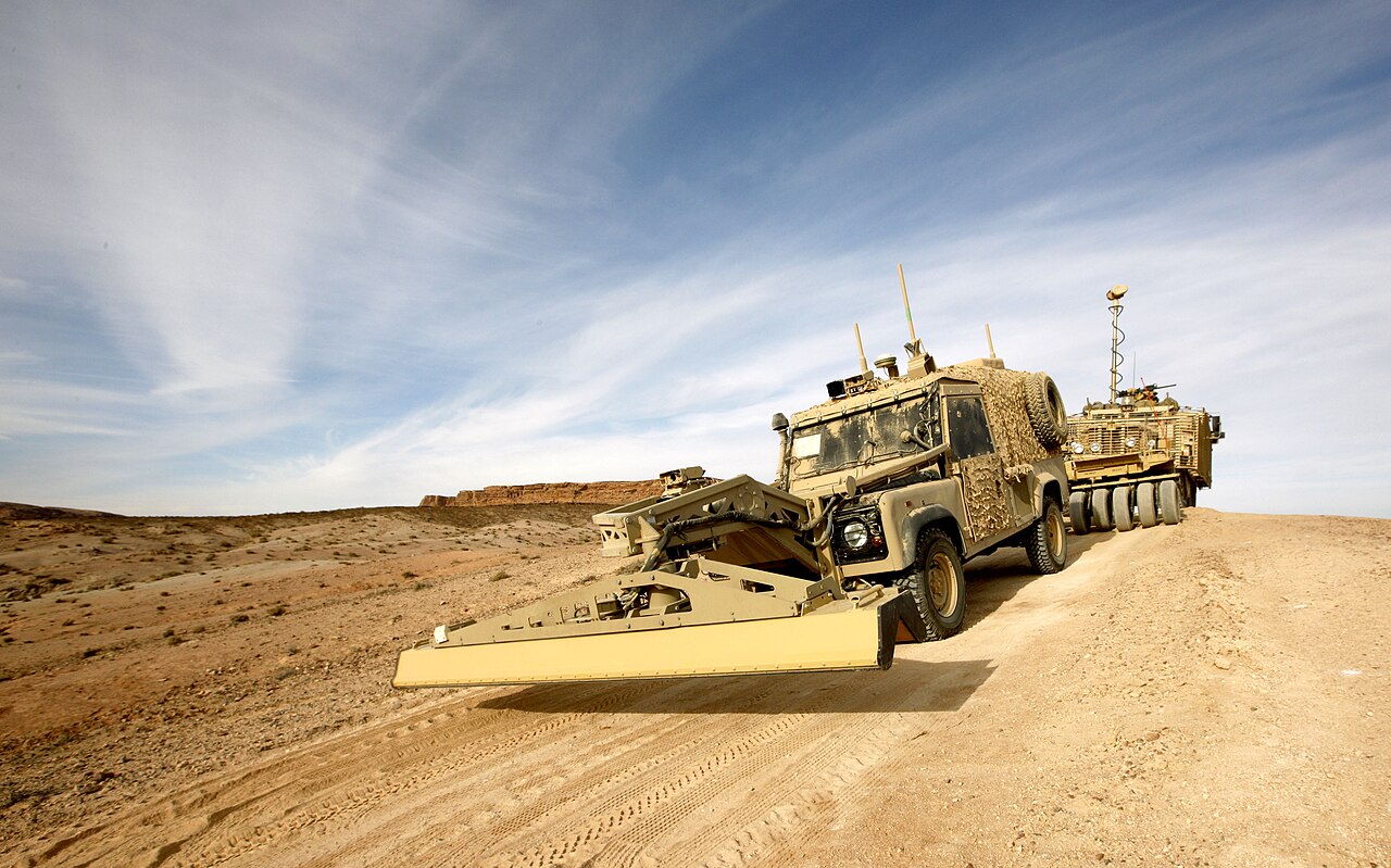 Panama route-clearance vehicle of 5 Armoured Engineer Squadron, Royal Engineers, trailed by a Mastiff during counter-IED training, December 2012