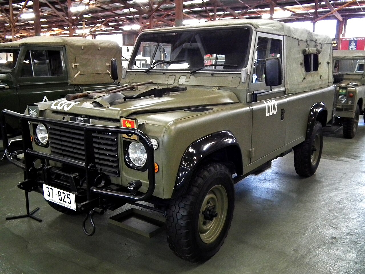 Australian Army Perentie 110 4x4 (ARN 37-825) at the Army Museum Bandiana, Victoria. No freely licensed photograph of the 38-vehicle Personnel Carryall could be found; this is the soft-top general service variant, which shares the Carryall's chassis, cab, running gear and olive drab finish but not its station wagon body.
