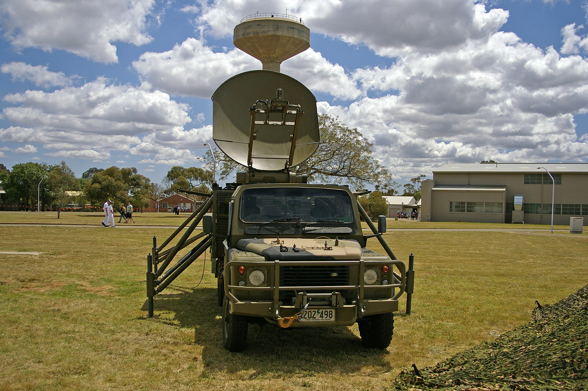A related enclosed-body 6×6 rather than a workshop truck: RAAF No. 1 Combat Communications Squadron's Parakeet satellite communications Perentie at RAAF Base Wagga, showing how a fixed rear module sits on the 6×6 chassis. The Parakeet has its own registry record; no freely licensed photograph of a General Maintenance, Electronic Repair or COMSEC Repair Perentie has been found.