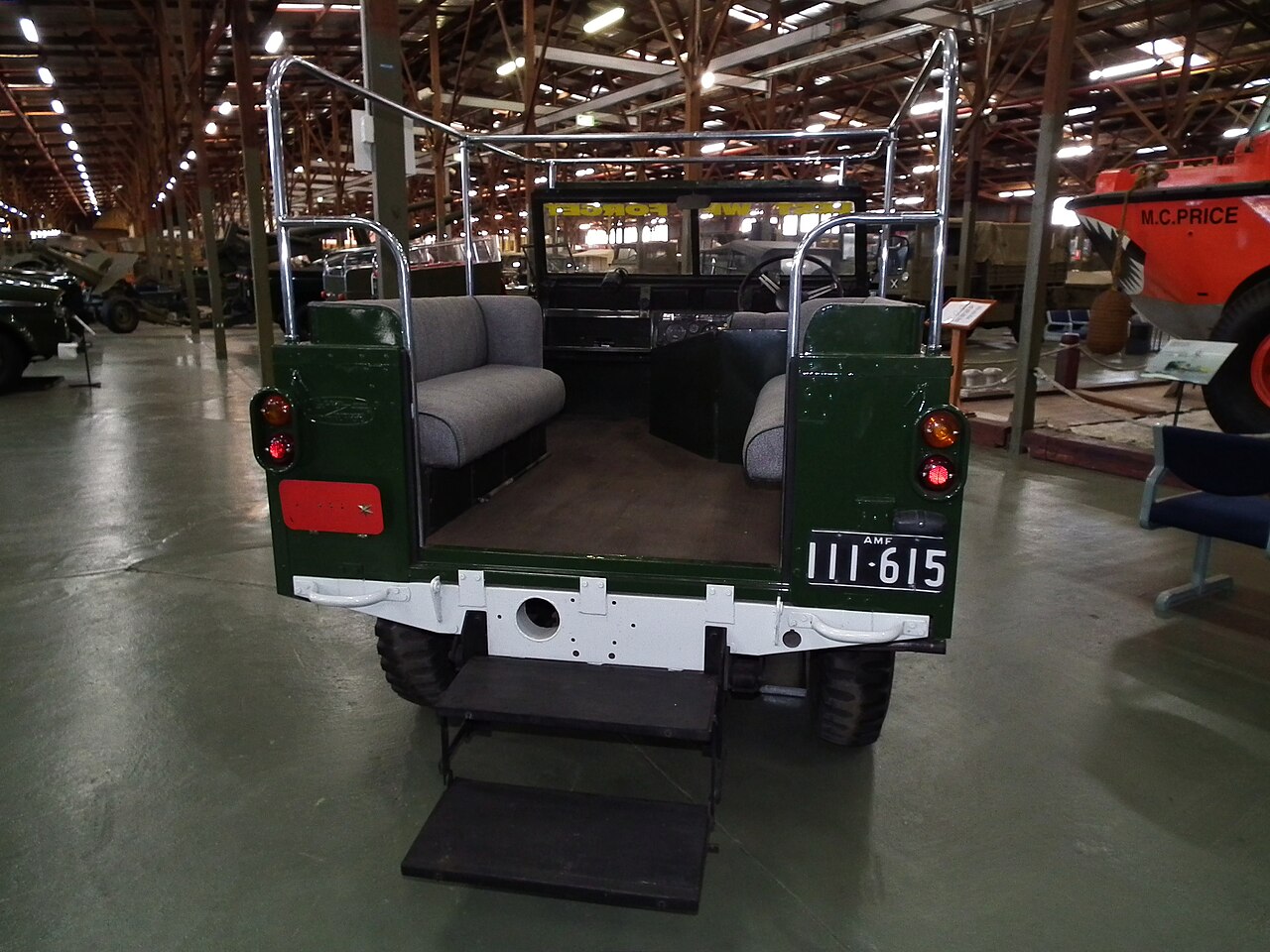 Another view of a 1958 ceremonial review Land Rover at the Army Museum Bandiana, showing the review handrails