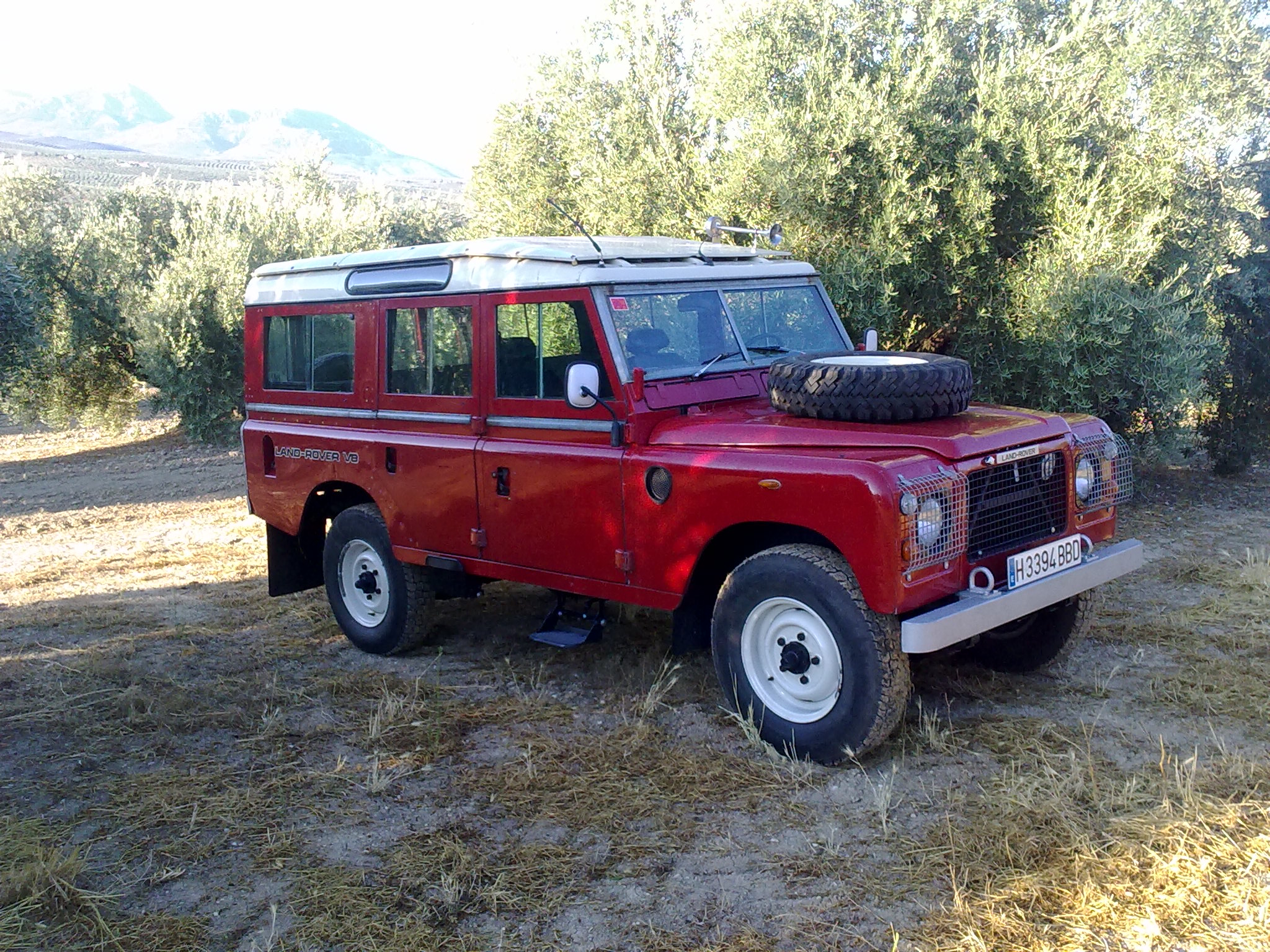 Land Rover 109 Stage One V8 in Cazorla, Andalusia, showing the flush front grille that distinguished the V8 model